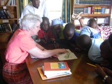 Sue Gravino reading with Grace Childrens Home kids, 2011.JPG